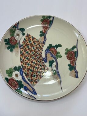 Decorative Ceramic Wall Plate with Red, Green and Blue Floral Pattern